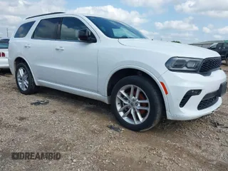2023 Dodge Durango GT Plus with VIN 1C4RDJDG9PC597246, listed as a IAAI auction lot 41910410 with 52,650 mi miles. Bid and sale history available at carsss.com. Image 1.