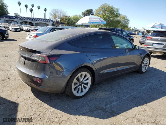 2022 Tesla Model 3 with VIN 5YJ3E1EA6NF143209, listed as a Copart auction lot 46321665 with 71,323 mi miles and Salvage Title. Bid and sale history available at carsss.com. Image 3.
