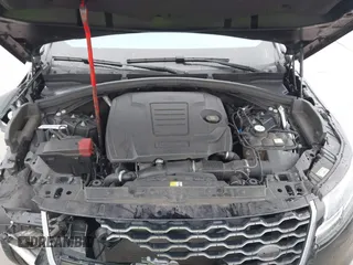 2020 Land Rover Range Rover Velar R-Dynamic S z VIN SALYK2EX5LA242529, wystawiony jako IAAI lot #41453257 z przebiegiem 72 442 mil mil oraz . Historia ofert i sprzedaży dostępna na DreamBid. Obrazek 10.