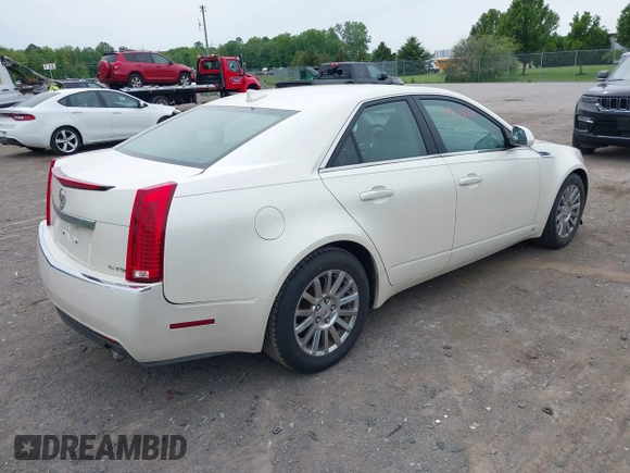 2009 Cadillac CTS RWD with VIN 1G6DF577290173180, listed as a IAAI auction lot 42376810 with 135,111 mi miles and . Bid and sale history available at DreamBid. Image 4.