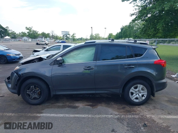 2015 Toyota RAV4 LE with VIN JTMBFREV4FD165163, listed as a IAAI auction lot 42638608 with 188,083 mi miles and . Bid and sale history available at DreamBid. Image 14.
