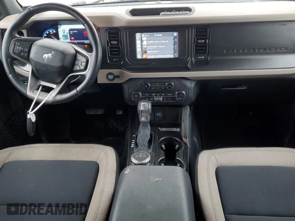 2021 Ford Bronco with VIN 1FMDE5BH9MLA96763, listed as a Copart auction lot 43749545 with 57,411 mi miles and Salvage Title. Bid and sale history available at DreamBid. Image 8.