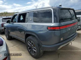 2023 Rivian R1S Adventure z VIN 7PDSGABA3PN018823, wystawiony jako Copart lot #53184595 z przebiegiem 36 677 mil mil oraz Szkoda całkowita • Salvage title. Historia ofert i sprzedaży dostępna na DreamBid. Obrazek 2.