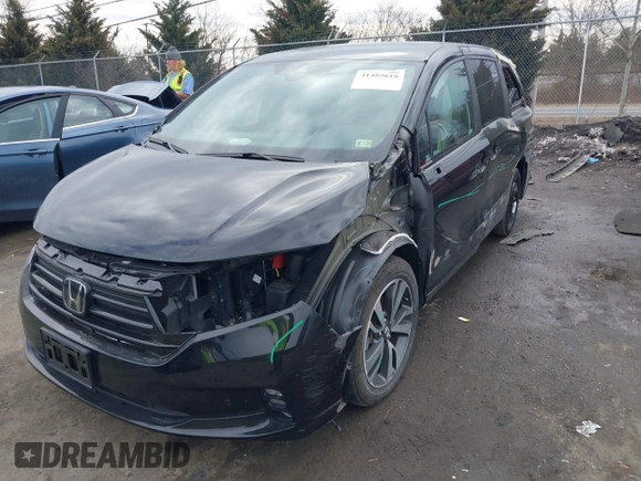 2023 Honda Odyssey Touring with VIN 5FNRL6H81PB068721, listed as a IAAI auction lot 41489618 with 20,202 mi miles and . Bid and sale history available at DreamBid. Image 6.