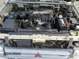 1998 Mitsubishi Montero z VIN JA4MR51RXWJ006418, wystawiony jako Copart lot #54878275 z przebiegiem 225 110 mil mil oraz Szkoda całkowita • Salvage title. Historia ofert i sprzedaży dostępna na DreamBid. Obrazek 12.