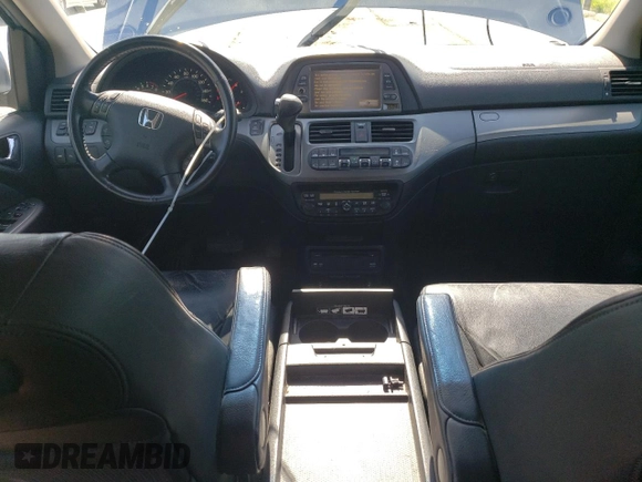 2006 Honda Odyssey Touring z VIN 5FNRL388X6B009356, wystawiony jako Copart lot #55991335 z przebiegiem 101 816 mil mil oraz Szkoda całkowita • Salvage title. Historia ofert i sprzedaży dostępna na DreamBid. Obrazek 8.