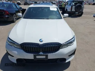 2020 BMW 3 Series 330i z VIN 3MW5R1J01L8B05556, wystawiony jako IAAI lot #42299891 z przebiegiem 61 404 mil mil oraz . Historia ofert i sprzedaży dostępna na DreamBid. Obrazek 12.