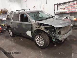 2020 Chevrolet Traverse LT with VIN 1GNEVHKW9LJ176834, listed as a IAAI auction lot 42211350 with 100,188 mi miles and . Bid and sale history available at DreamBid. Image 1.