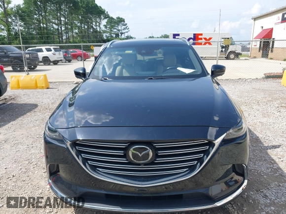 2022 Mazda CX-9 Grand Touring with VIN JM3TCBDYXN0627657, listed as a IAAI auction lot 42498856 with 61,044 mi miles and . Bid and sale history available at DreamBid. Image 12.