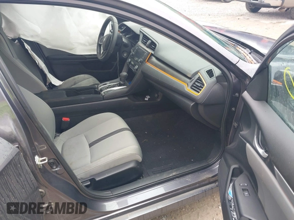 2020 Honda Civic LX z VIN 19XFC2F66LE012481, wystawiony jako IAAI lot #42297600 z przebiegiem 56 602 mil mil oraz . Historia ofert i sprzedaży dostępna na DreamBid. Obrazek 5.