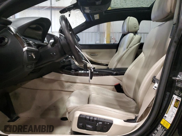 2015 BMW 6 Series 640i xDrive z VIN WBA6B8C58FD453159, wystawiony jako Copart lot #88931285 z przebiegiem 145 656 mil mil oraz Szkoda całkowita • Salvage title. Historia ofert i sprzedaży dostępna na DreamBid. Obrazek 7.