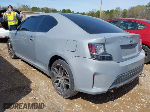 2014 Scion tC with VIN JTKJF5C78E3075164, listed as a IAAI auction lot 41922609 with 142,064 mi miles. Bid and sale history available at carsss.com. Image 3.
