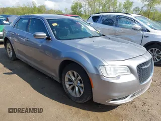2016 Chrysler 300 Anniversary Edition with VIN 2C3CCAAG4GH238255, listed as a IAAI auction lot 42163236 with 253,452 mi miles and . Bid and sale history available at DreamBid. Image 1.