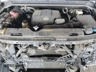 2011 Nissan Titan Pro-4X z VIN 1N6BA0EC9BN304469, wystawiony jako Copart lot #52982815 z przebiegiem 108 829 mil mil oraz Szkoda całkowita • Salvage title. Historia ofert i sprzedaży dostępna na DreamBid. Obrazek 11.