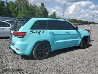2015 Jeep Grand Cherokee SRT with VIN 1C4RJFDJXFC861588, listed as a Copart auction lot 51301235 with 35,927 mi miles and Clean Title. Bid and sale history available at carsss.com. Image 3.