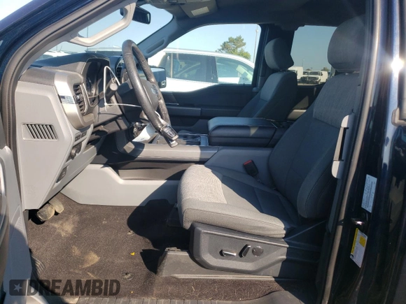 2021 Ford F-150 XL with VIN 1FTFX1E88MKD05444, listed as a Copart auction lot 71669704 with 35,779 mi miles and Salvage title. Bid and sale history available at DreamBid. Image 7.