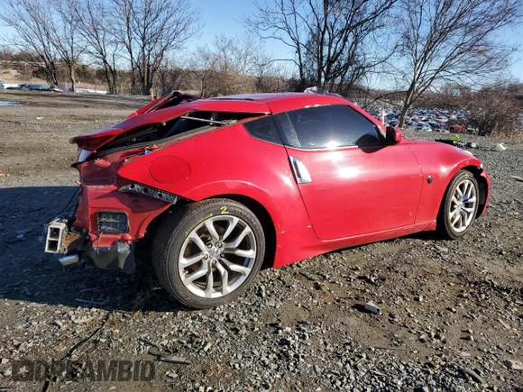 2014 Nissan 370Z Nismo with VIN JN1AZ4EH7EM630228, listed as a Copart auction lot 87024444 with 88,456 mi miles and Salvage title. Bid and sale history available at DreamBid. Image 3.