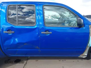 2014 Nissan Frontier SV with VIN 1N6AD0ER1EN765693, listed as a IAAI auction lot 41560914 with 165,572 mi miles and . Bid and sale history available at DreamBid. Image 14.