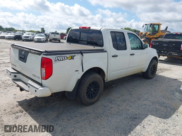 2018 Nissan Frontier SV with VIN 1N6AD0EV0JN744809, listed as a IAAI auction lot 42508839 with 99,049 mi miles and . Bid and sale history available at DreamBid. Image 4.