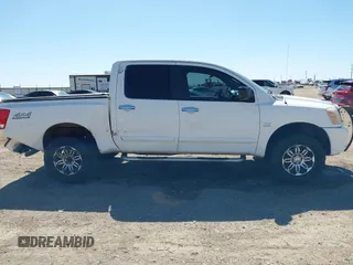 2004 Nissan Titan LE z VIN 1N6AA07B14N528418, wystawiony jako IAAI lot #42281318 z przebiegiem 200 902 mil mil oraz . Historia ofert i sprzedaży dostępna na DreamBid. Obrazek 13.