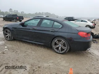 2015 BMW M6 z VIN WBS6C9C50FD467894, wystawiony jako Copart lot #70394234 z przebiegiem 72 625 mil mil oraz Szkoda całkowita • Salvage title. Historia ofert i sprzedaży dostępna na DreamBid. Obrazek 2.