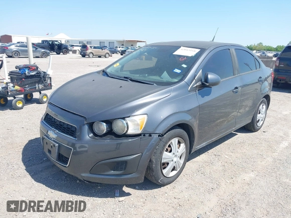 2013 Chevrolet Sonic LS with VIN 1G1JA5SH2D4112064, listed as a IAAI auction lot 42043168 with 215,480 mi miles and . Bid and sale history available at DreamBid. Image 2.
