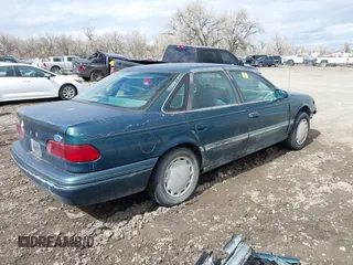 1995 Ford Taurus GL with VIN 1FALP52U2SA113070, listed as a IAAI auction lot 41869576 with 16,935 mi miles and . Bid and sale history available at DreamBid. Image 4.