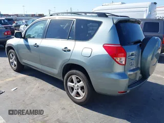2006 Toyota RAV4 with VIN JTMZD33V465012121, listed as a IAAI auction lot 42013354 with 214,726 mi miles. Bid and sale history available at carsss.com. Image 3.