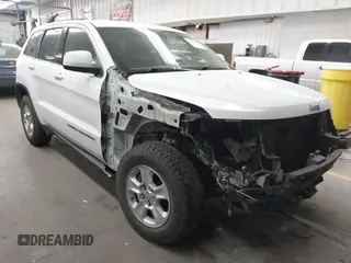 2017 Jeep Grand Cherokee Laredo with VIN 1C4RJEAG3HC888203, listed as a IAAI auction lot 41744695 with 123,138 mi miles. Bid and sale history available at carsss.com. Image 1.