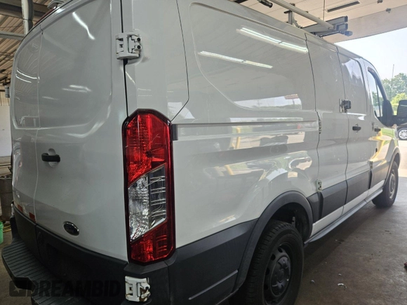 2015 Ford Transit Cargo z VIN 1FTNR1ZM8FKA55185, wystawiony jako IAAI lot #42515954 z przebiegiem 86 918 mil mil oraz . Historia ofert i sprzedaży dostępna na DreamBid. Obrazek 23.