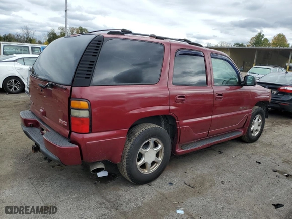 2004 GMC Yukon Denali with VIN 1GKEK63U94J135340, listed as a Copart auction lot 74230534 with 164,235 mi miles and Salvage Title. Bid and sale history available at carsss.com. Image 3.