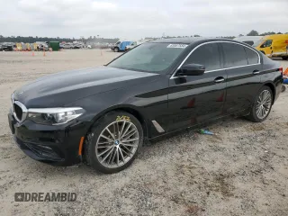 2018 BMW 5 Series 530i with VIN WBAJA5C54JG899845, listed as a Copart auction lot 83007584 with 57,379 mi miles and Salvage Title. Bid and sale history available at DreamBid. Image 1.
