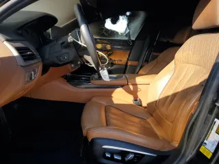 2016 BMW 7 Series 750i with VIN WBA7F0C57GGL99332, listed as a Copart auction lot 56144533 with 95,626 mi miles. Bid and sale history available at carsss.com. Image 7.