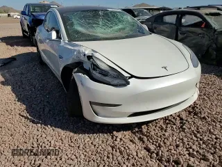 2020 Tesla Model 3 Standard Range Plus with VIN 5YJ3E1EA4LF799597, listed as a Copart auction lot 76401374 with 77,506 mi miles and Salvage Title. Bid and sale history available at DreamBid. Image 11.