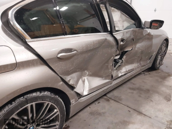 2019 BMW 5 Series 540i xDrive with VIN WBAJE7C58KWW24695, listed as a IAAI auction lot 41346095 with 65,374 mi miles and . Bid and sale history available at carsss.com. Image 6.
