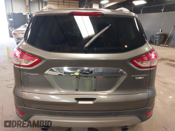 2014 Ford Escape Titanium with VIN 1FMCU9JX0EUE45254, listed as a IAAI auction lot 42038700 with 60,103 mi miles. Bid and sale history available at carsss.com. Image 16.