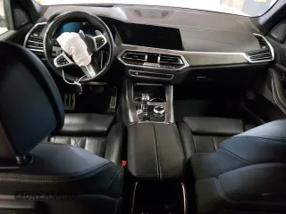 2020 BMW X5 M50i with VIN 5UXJU4C00L9C27198, listed as a Copart auction lot 76705264 with 0 mi miles and Salvage Title. Bid and sale history available at carsss.com. Image 8.