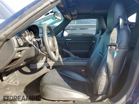 2007 Mazda MX-5 Miata Touring with VIN JM1NC25F770138120, listed as a Copart auction lot 60777425 with 184,029 mi miles and Salvage title. Bid and sale history available at DreamBid. Image 7.