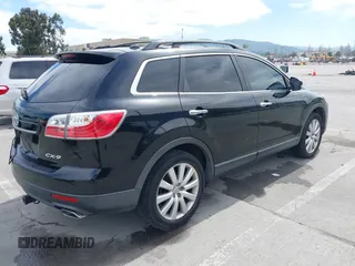 2010 Mazda CX-9 Grand Touring with VIN JM3TB2MV7A0211357, listed as a IAAI auction lot 42013067 with 161,081 mi miles and . Bid and sale history available at DreamBid. Image 4.