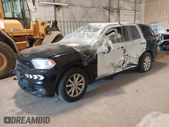 2020 Dodge Durango Pursuit with VIN 1C4SDJFT6LC215079, listed as a IAAI auction lot 40276358 with 96,019 mi miles and . Bid and sale history available at DreamBid. Image 2.
