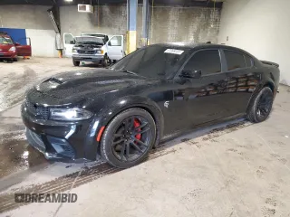 2021 Dodge Charger SRT Hellcat Widebody z VIN 2C3CDXL9XMH617917, wystawiony jako Copart lot #57069205 z przebiegiem 34 859 mil mil oraz Szkoda całkowita • Salvage title. Historia ofert i sprzedaży dostępna na DreamBid. Obrazek 1.