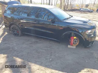 2018 Dodge Durango SRT with VIN 1C4SDJGJ6JC416538, listed as a IAAI auction lot 41440038 with 67,650 mi miles and . Bid and sale history available at DreamBid. Image 6.