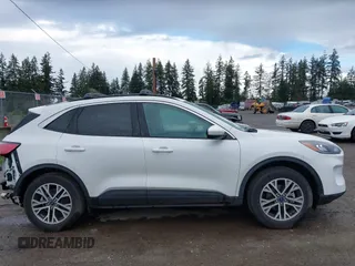 2021 Ford Escape SEL with VIN 1FMCU9H91MUB35409, listed as a IAAI auction lot 41900711 with 19,295 mi miles and . Bid and sale history available at DreamBid. Image 14.