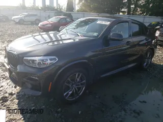 2021 BMW X4 M40i with VIN 5UX2V5C08M9G87220, listed as a Copart auction lot 64087953 with 0 mi miles. Bid and sale history available at carsss.com. Image 1.