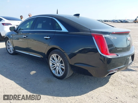 2018 Cadillac XTS Luxury with VIN 2G61M5S36J9120571, listed as a IAAI auction lot 41486816 with 77,302 mi miles. Bid and sale history available at carsss.com. Image 3.
