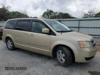 2010 Dodge Grand Caravan with VIN 2D4RN5D12AR197403, listed as a Copart auction lot 54356515 with 105,318 mi miles and Salvage Title. Bid and sale history available at DreamBid. Image 4.