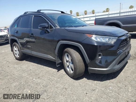 2021 Toyota RAV4 XLE with VIN 2T3P1RFV8MC167485, listed as a Copart auction lot 57814355 with 73,188 mi miles and Salvage title. Bid and sale history available at DreamBid. Image 4.