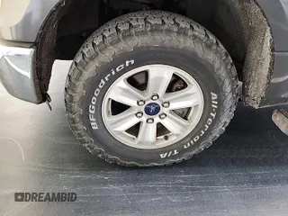 2016 Ford F-150 XLT with VIN 1FTFX1EF7GKE19857, listed as a IAAI auction lot 42148063 with 112,511 mi miles. Bid and sale history available at carsss.com. Image 1.