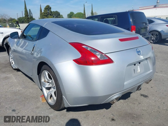 2010 Nissan 370Z Touring with VIN JN1AZ4EH6AM506591, listed as a IAAI auction lot 41838902 with 103,895 mi miles. Bid and sale history available at carsss.com. Image 3.