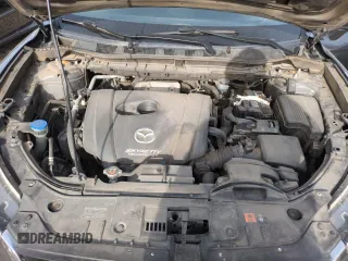 2015 Mazda CX-5 Grand Touring with VIN JM3KE4DY3F0495411, listed as a Copart auction lot 50077765 with 136,191 mi miles and Salvage Title. Bid and sale history available at DreamBid. Image 11.
